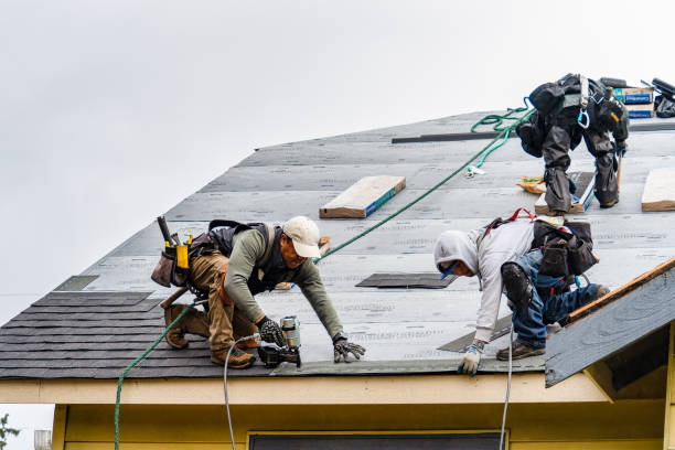 Professional Gutter Installation technician working in Poseyville, IN